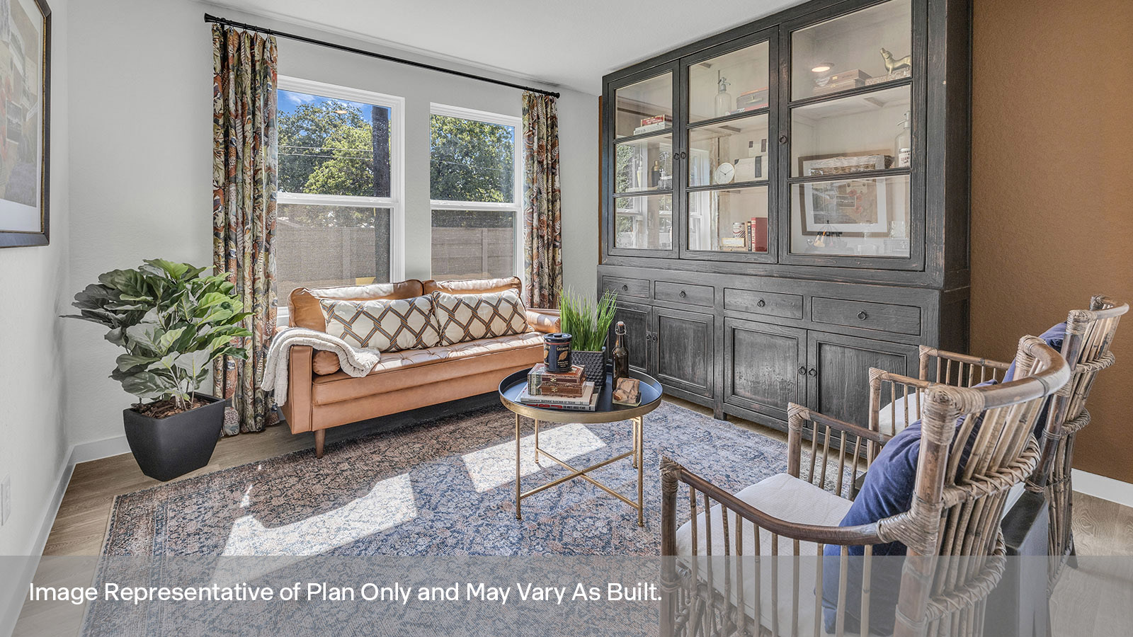 Study with carpeting and two windows.