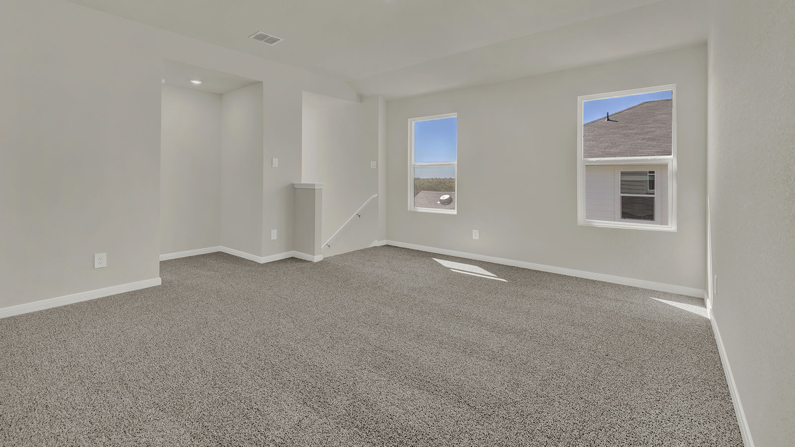 Loft, multi-use game room space with bedroom and bathroom upstairs hall access, includes open sightlines