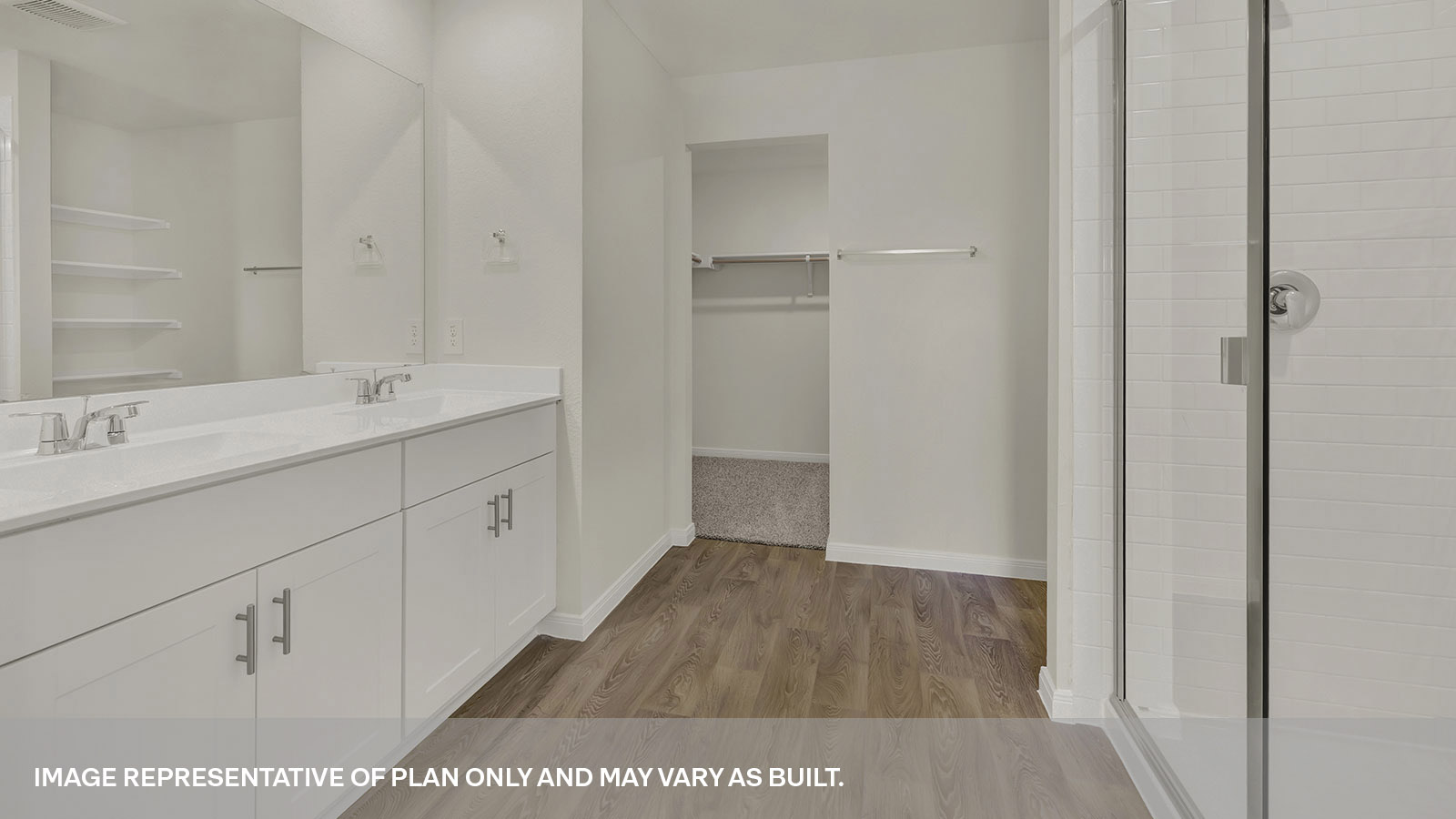 Main bathroom with vanity and water closet.