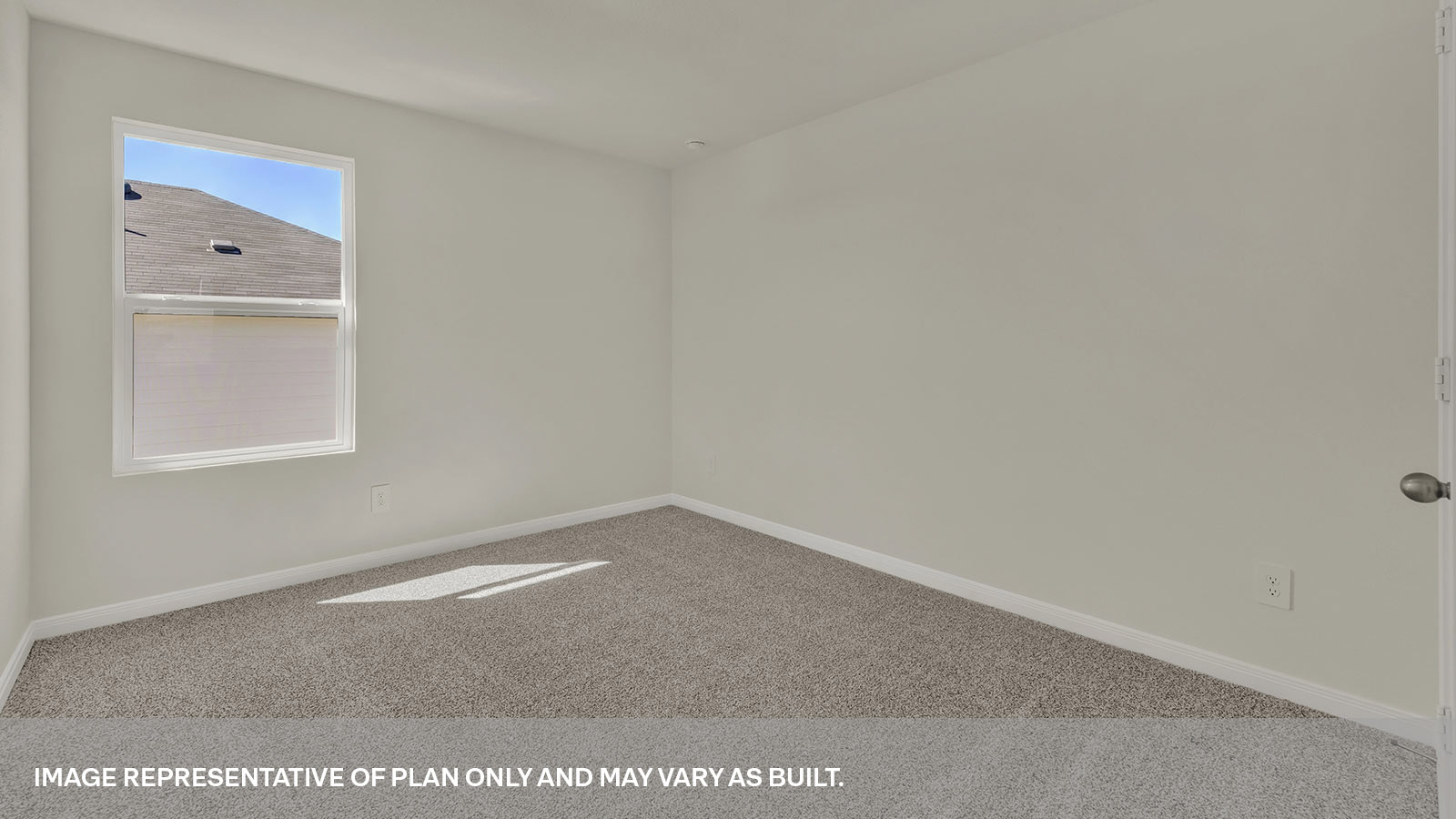 Secondary bedroom with carpeting and one window.