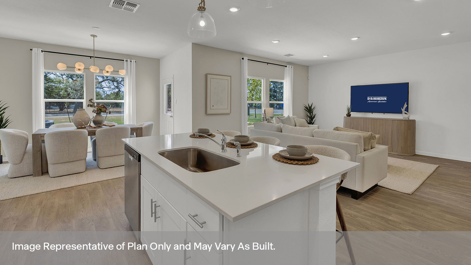 Kitchen overlooking dining and living room.
