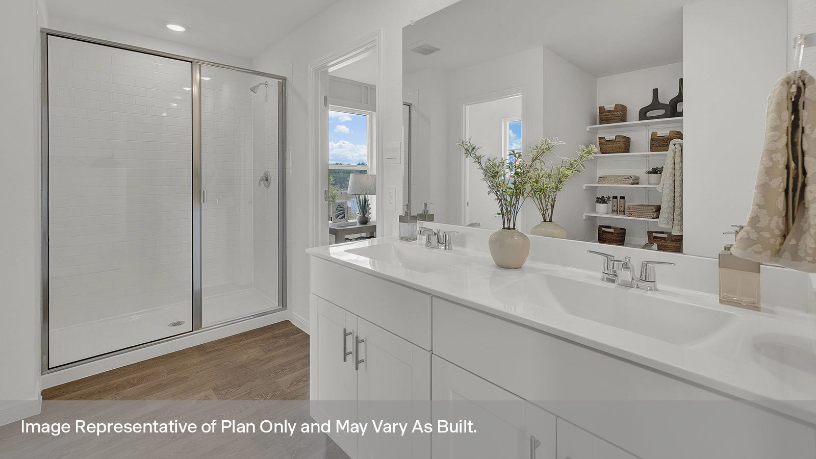 Main bathroom with double sink vanity and stand in shower.