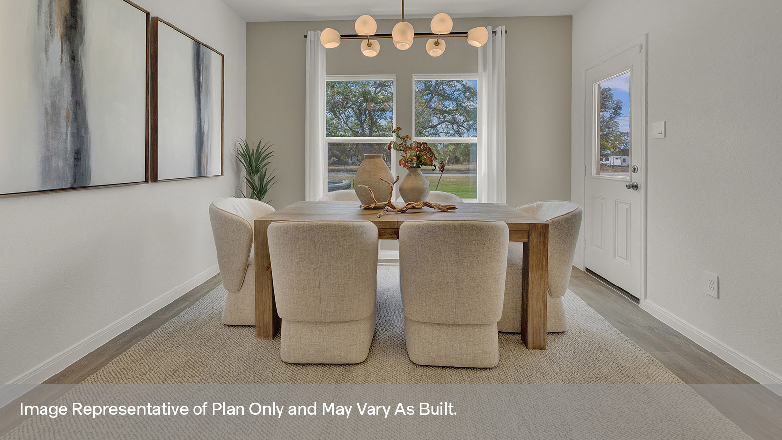Dining room with vinyl flooring and two windows.