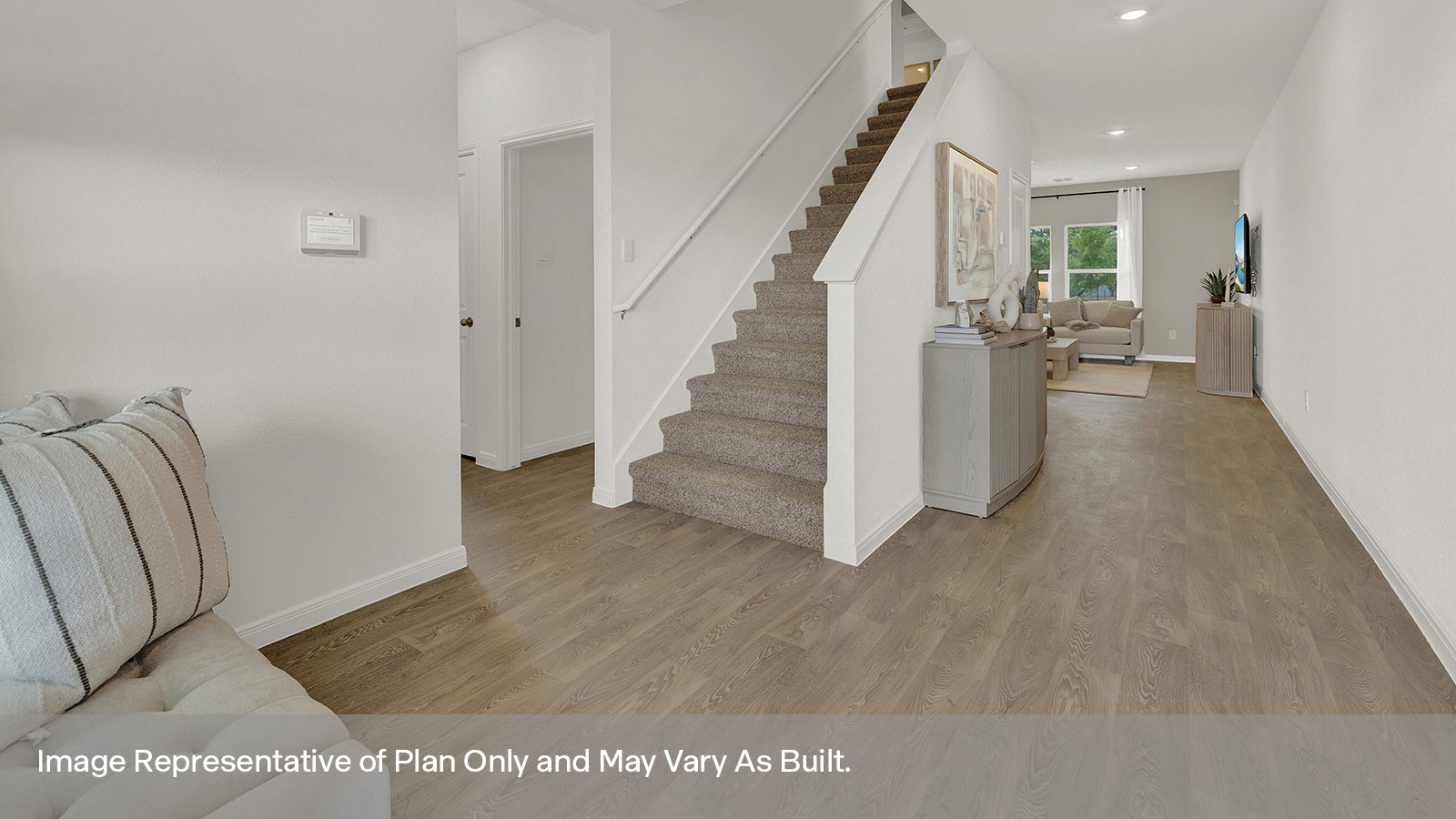 Entry hallway with stairs leading to the gameroom.
