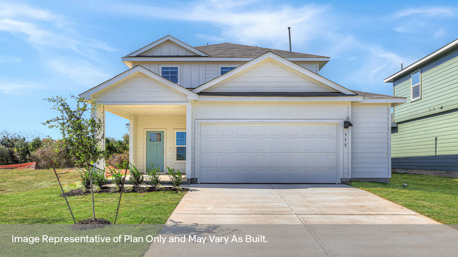 Two-story farmhouse exterior photo with 2 car garage.