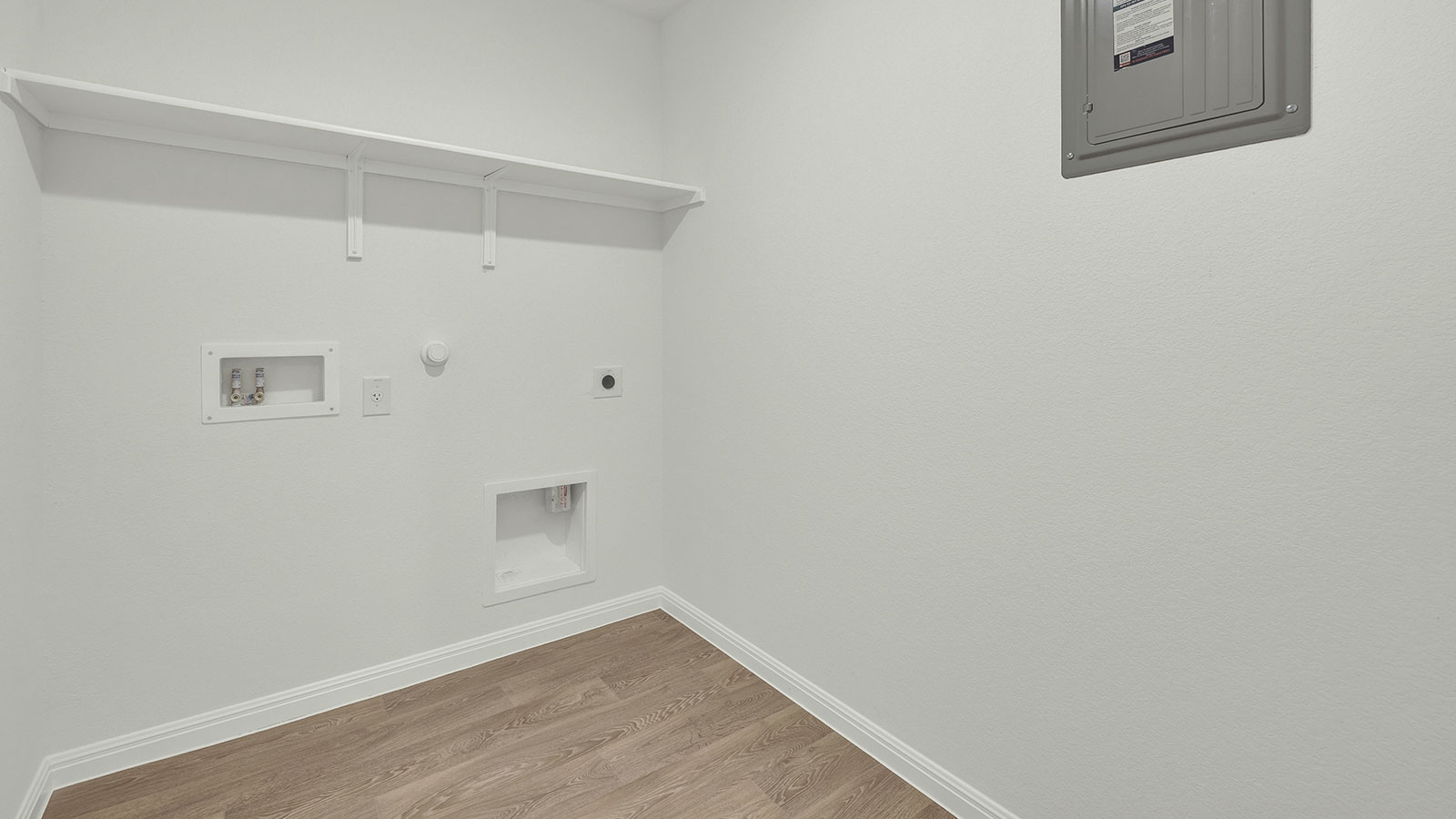 utility room with wooden shelf