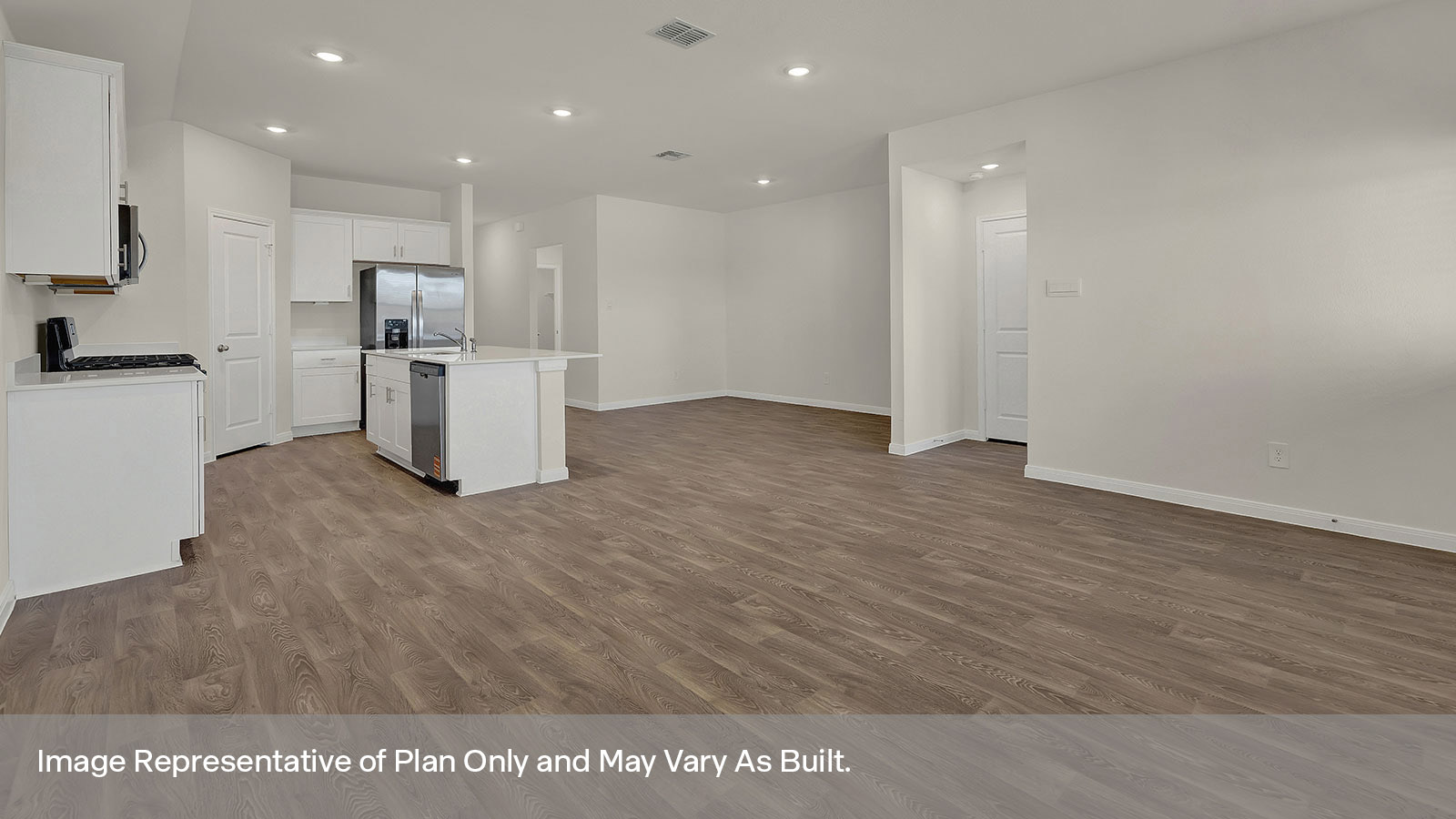 Living room opening to the dining room and kitchen.