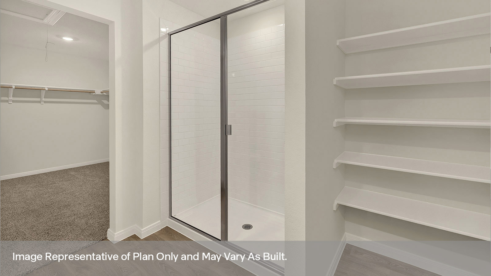 Main bathroom with wooden shelving and stand in shower with shower glass doors.
