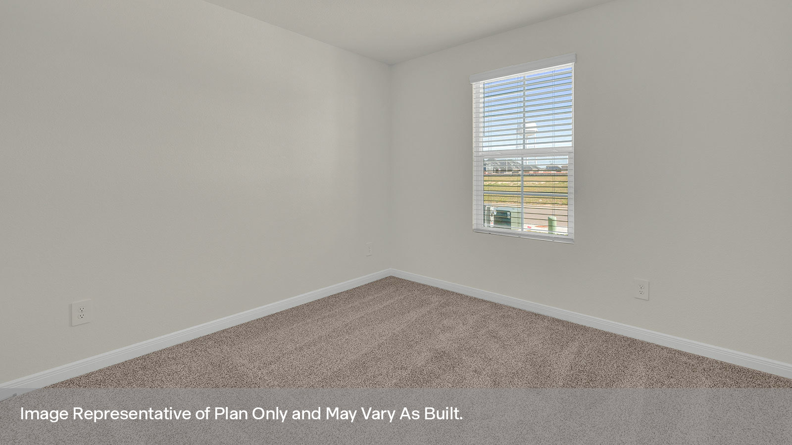Front bedroom with carpeting and one window.