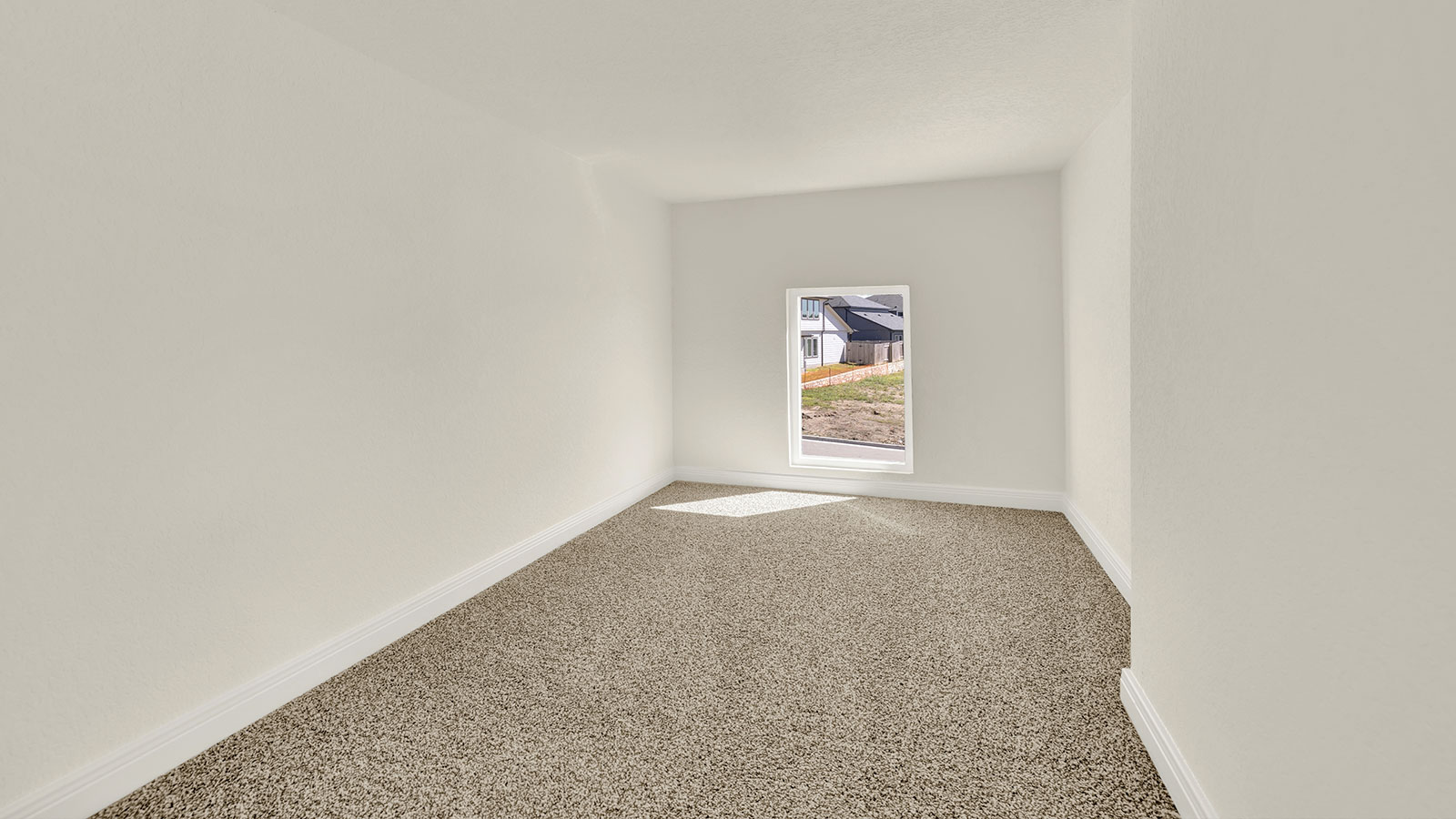 Gameroom of off the staircase with carpeting and two windows.