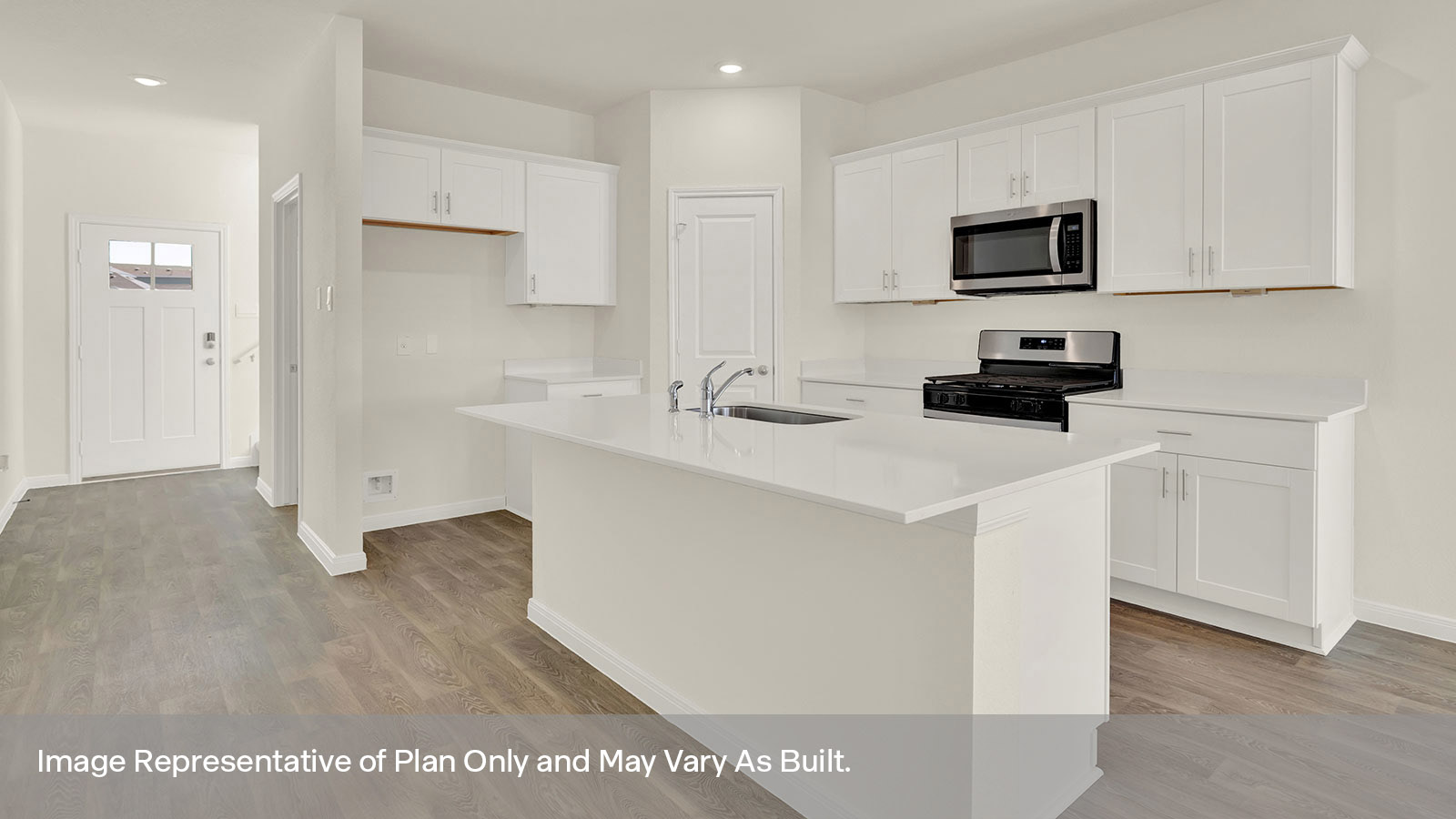 Kitchen with kitchen island and granite countertops.