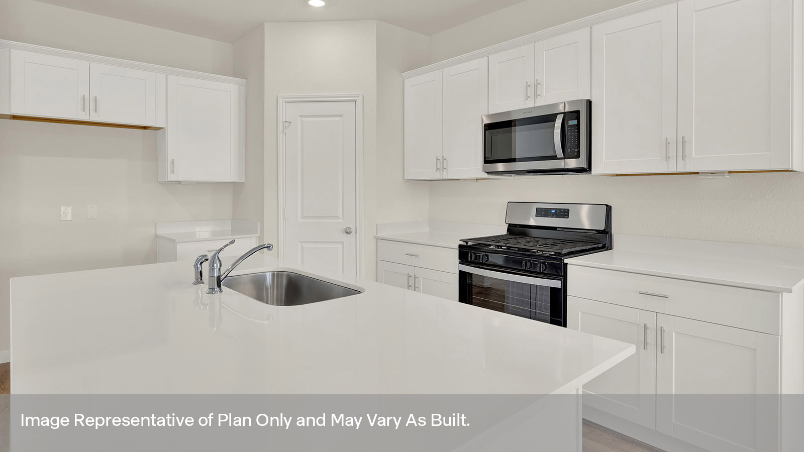 Kitchen with kitchen island and granite countertops.