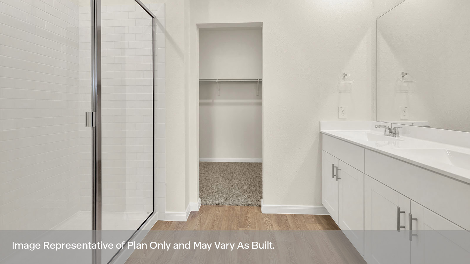 Main bathroom with double sink vanity and stand in shower.