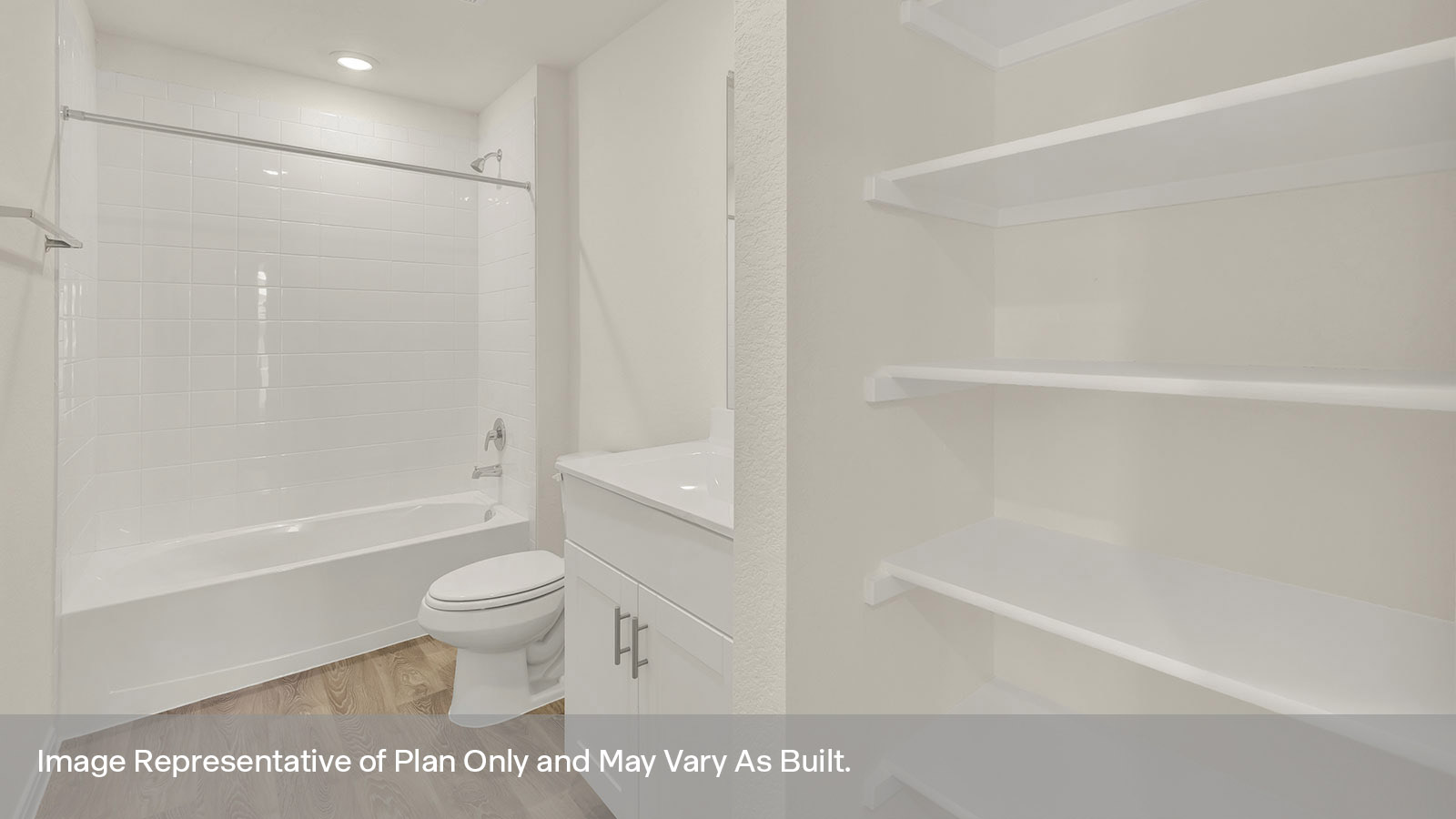 Hall bathroom with wooden shelving, toilet and tub.