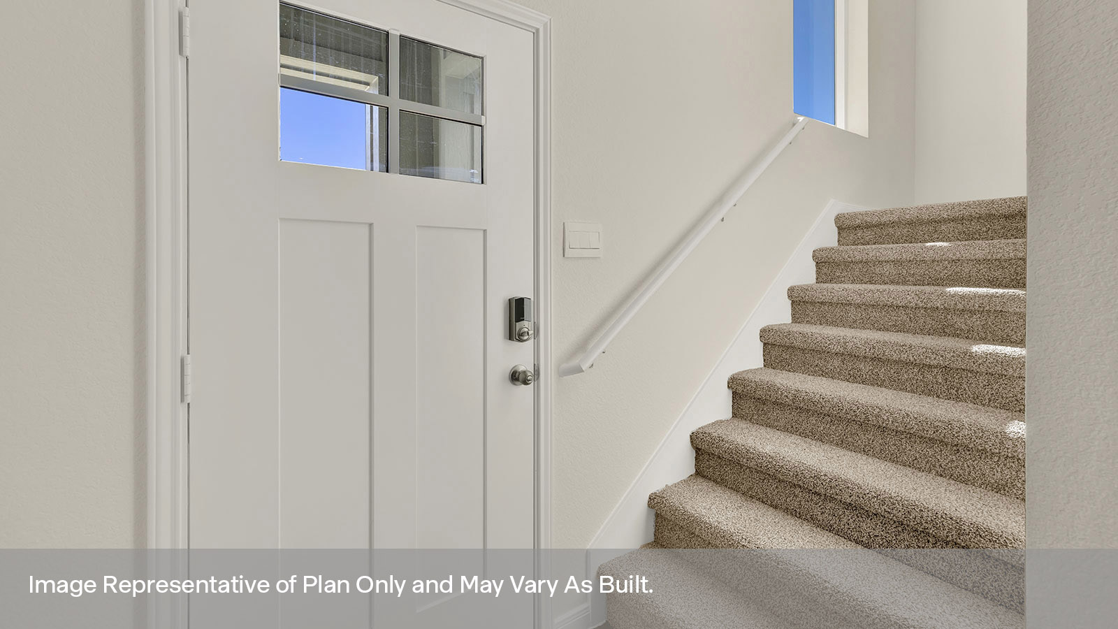 Entry hallway with stairs leading to the gameroom.
