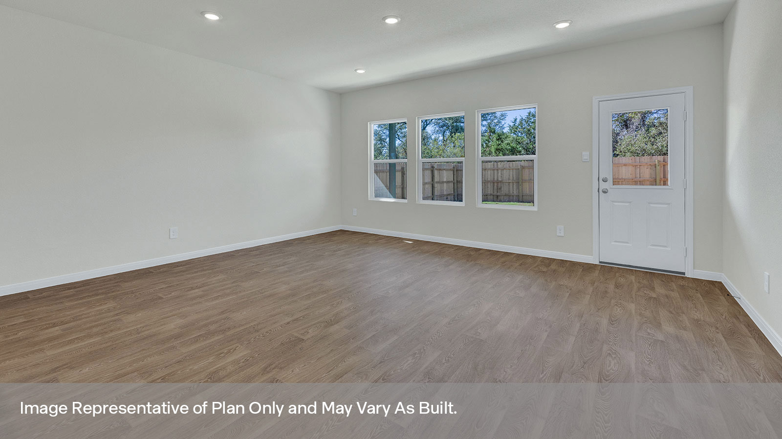 Living room with vinyl flooring, two windows, and a half lite exterior door.