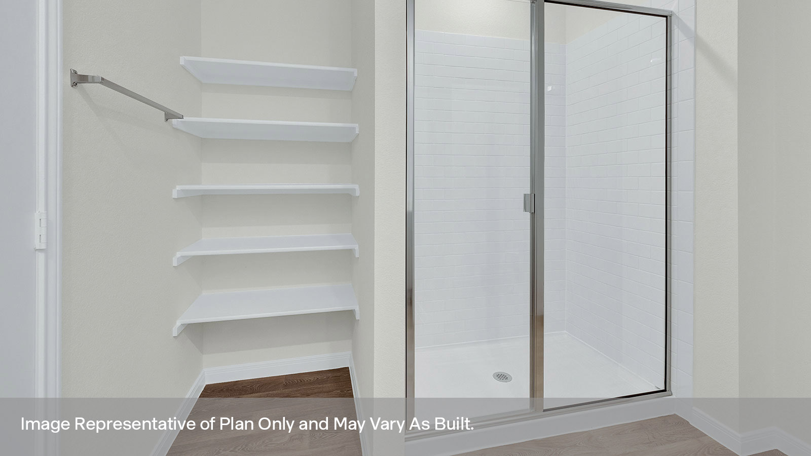 Main bathroom with stand in shower and wooden shelving.