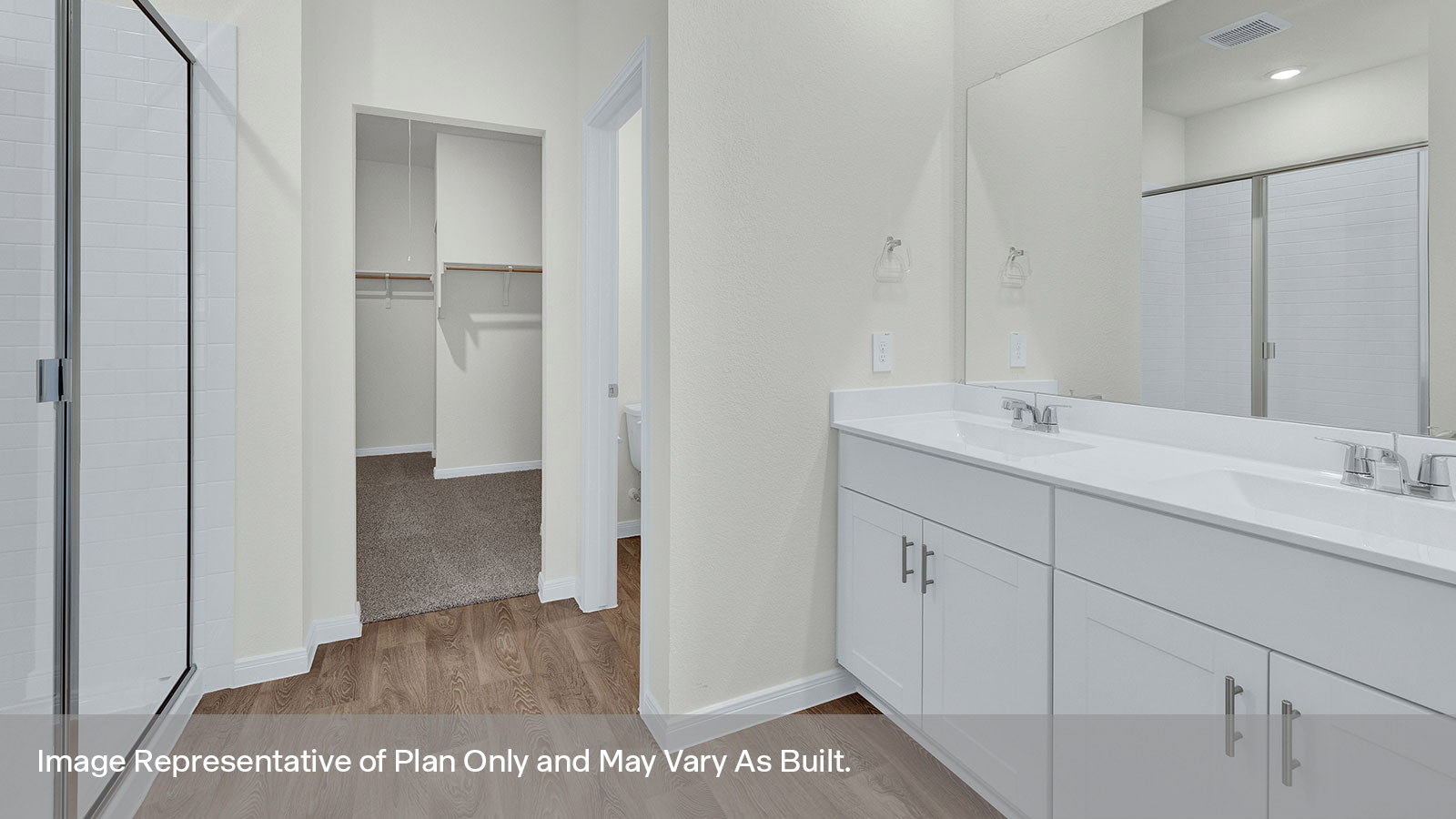 Main bathroom with dual sink vanity.