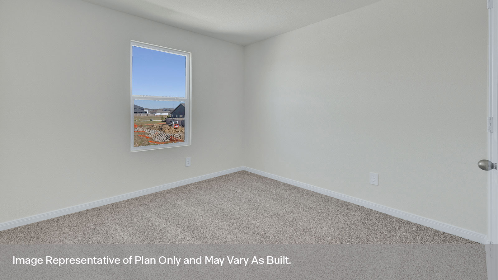 Bedroom with carpeting and one window.