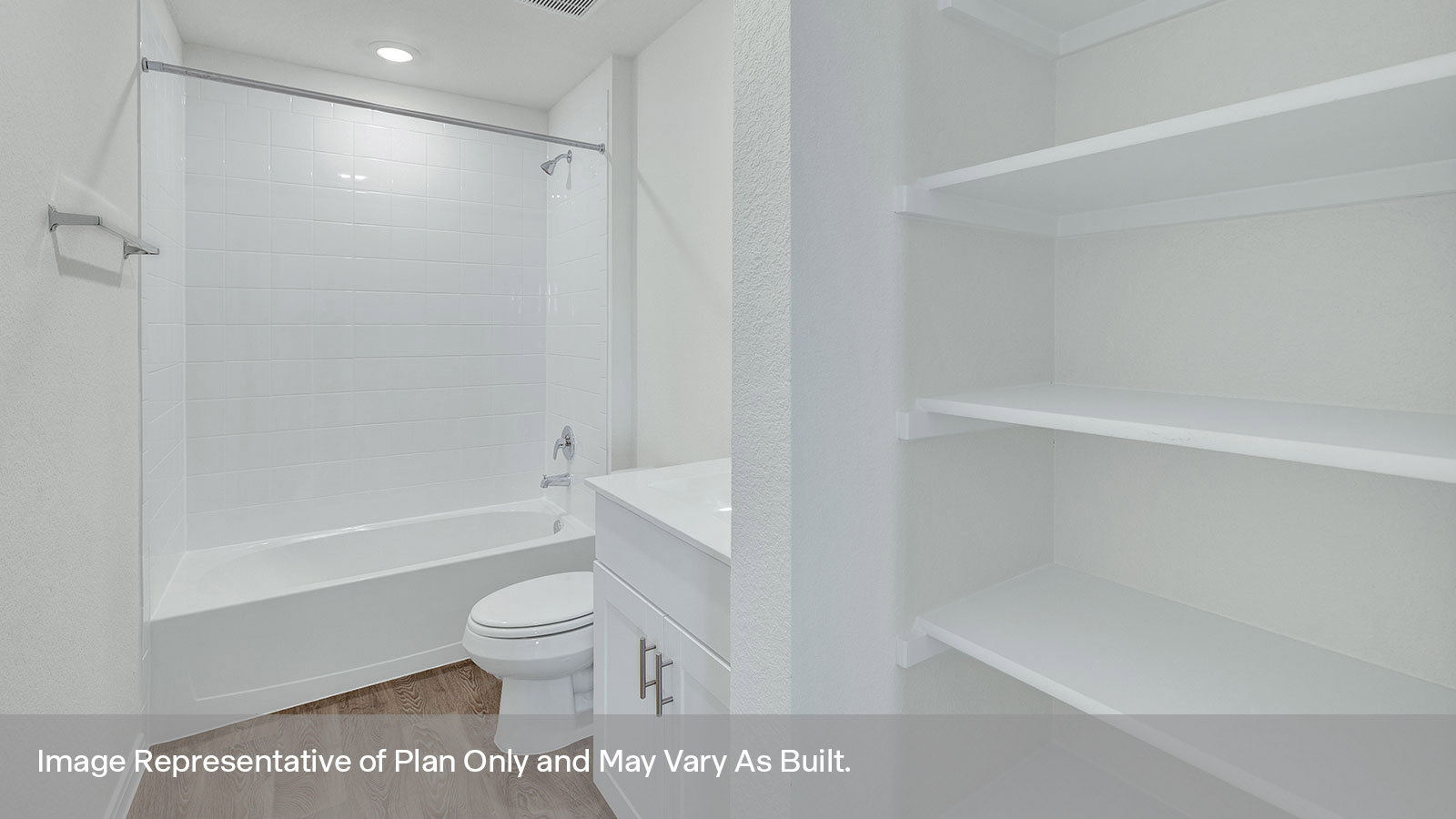 Hall bathroom with wooden shelving, toilet, and tub with tile surround.