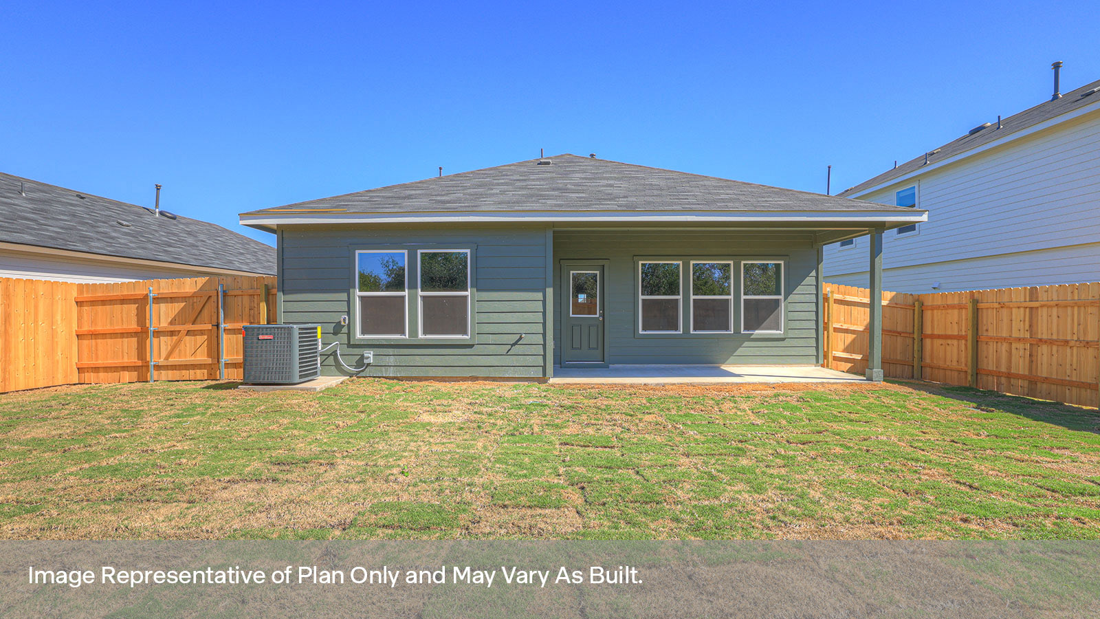 Covered patio and fully sodded backyard with privacy fence.