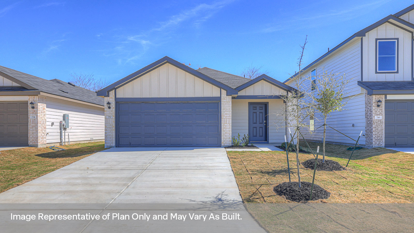 Siding Exterior with a two car garage and covered entry