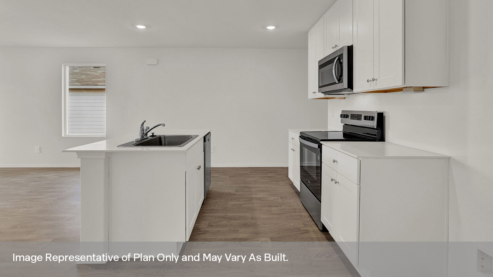 Kitchen with vinyl flooring and appliances