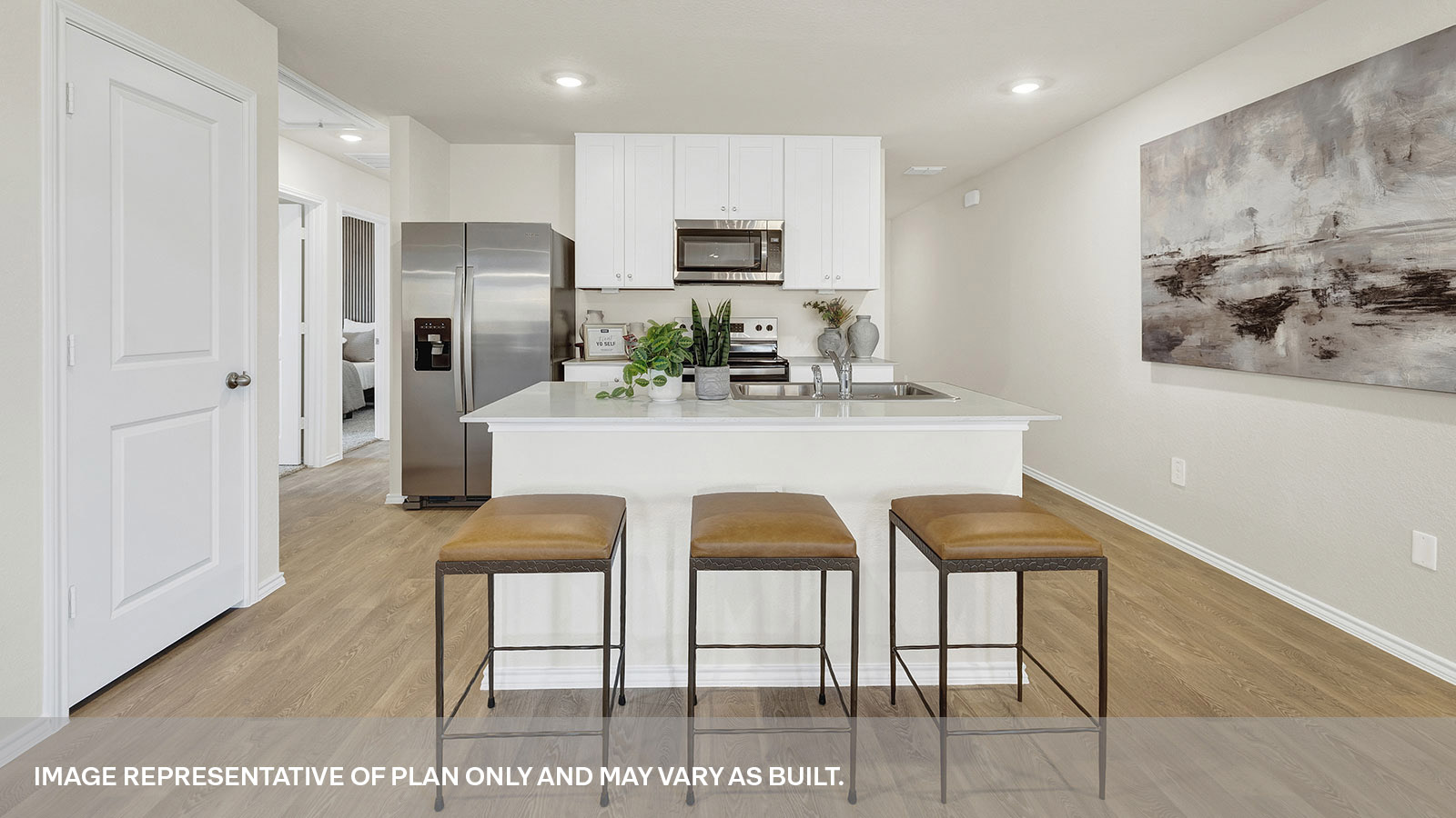 Kitchen featuring vinyl floors and stainless appliances