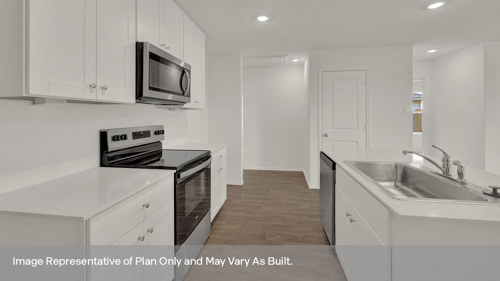 Kitchen with a gas stove/oven and an over range microwave