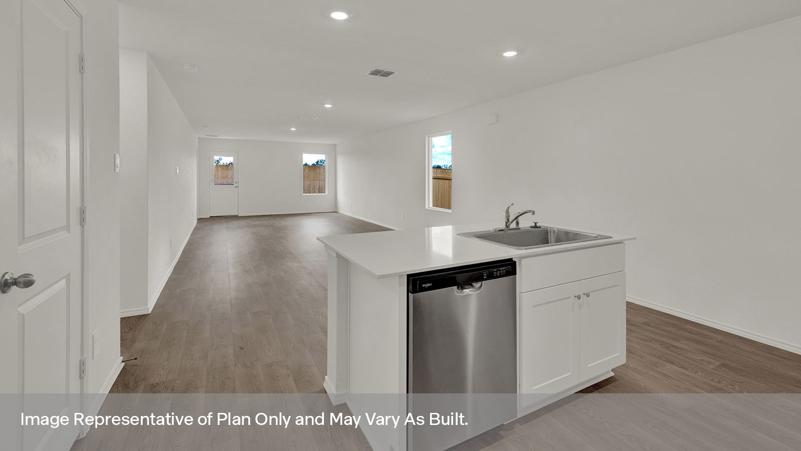 Kitchen featuring a pantry and looking to the dining room