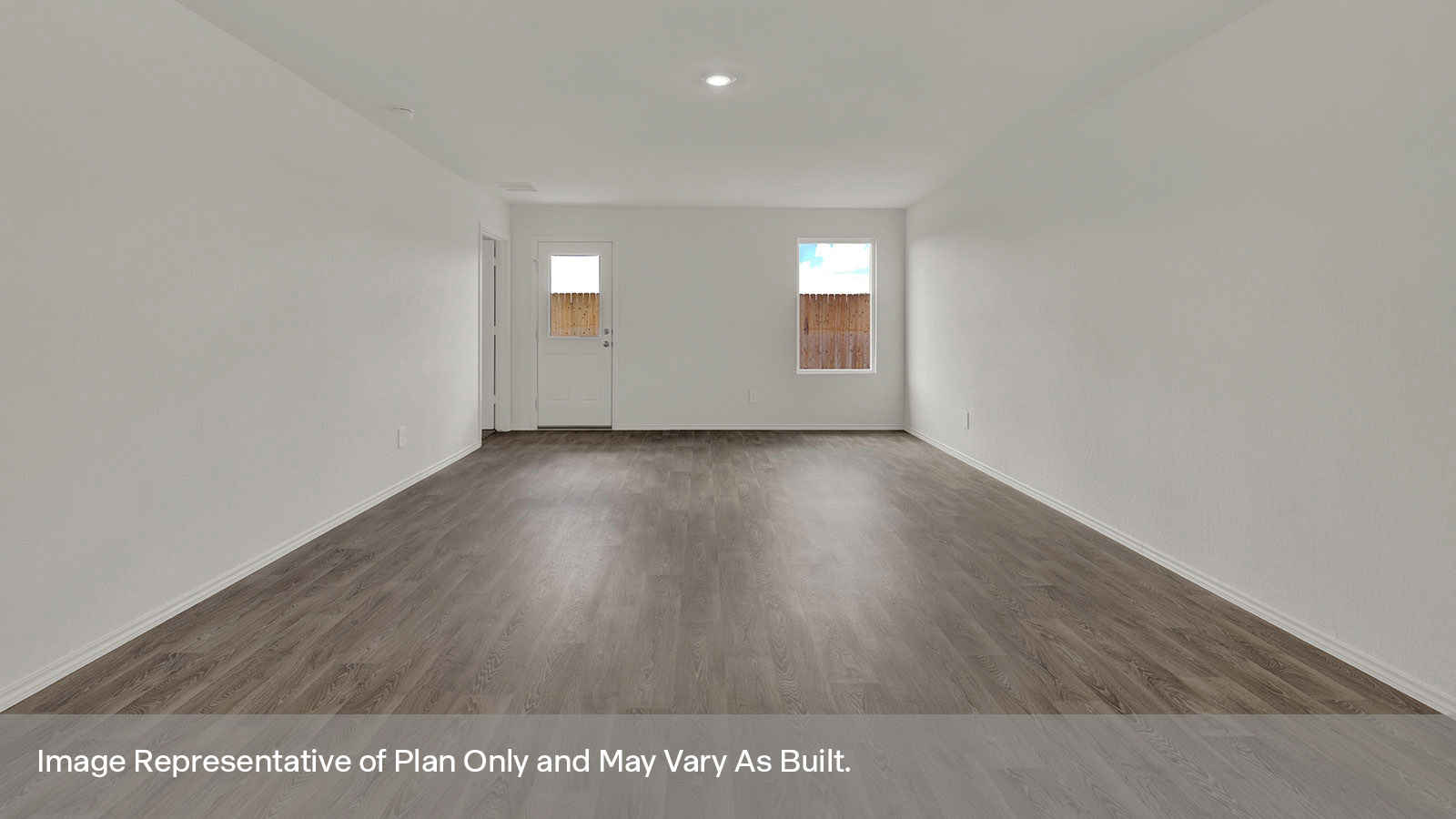 Living room showing one of two windows and the door to the back yard