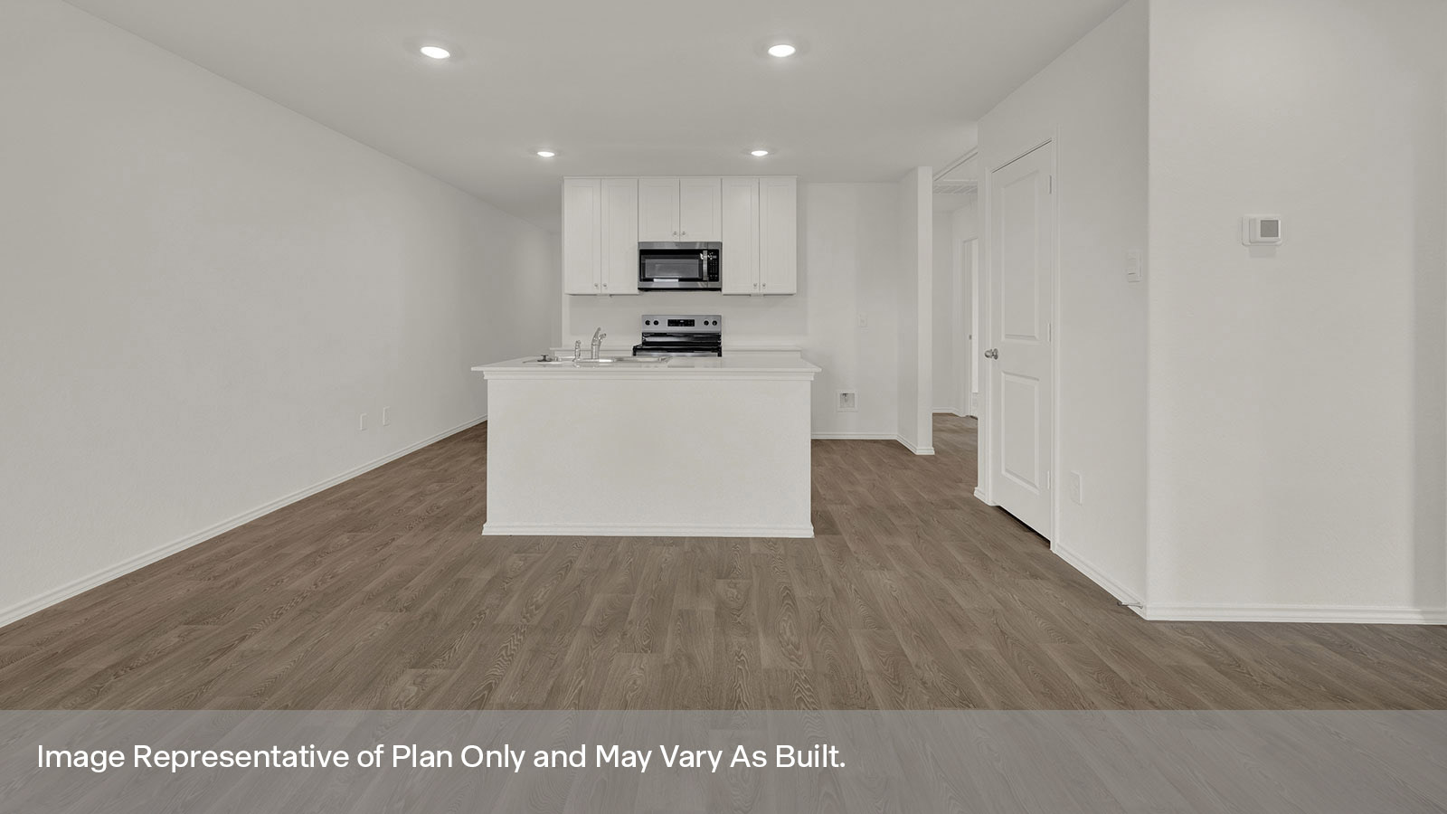 Kitchen featuring an island and stainless appliances