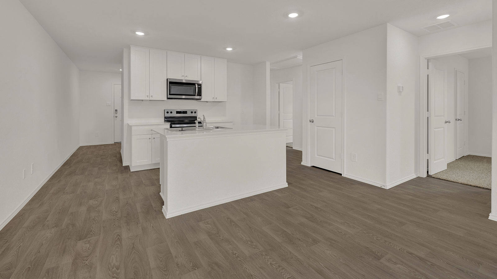 Entry hallway leading to the kitchen.