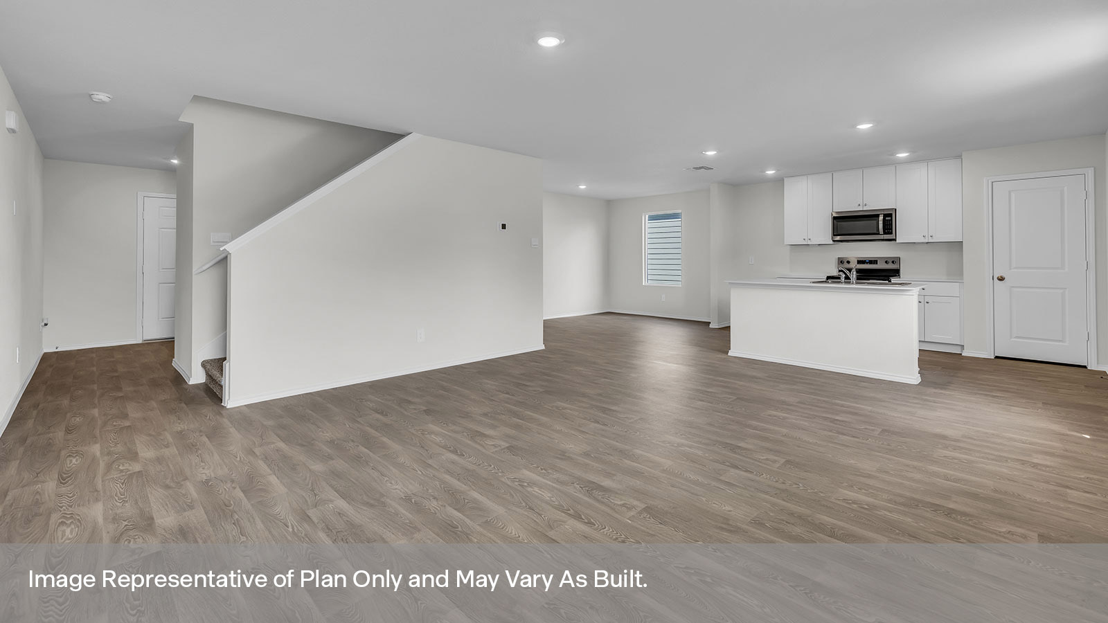 View from the living room showing the kitchen and the dining area
