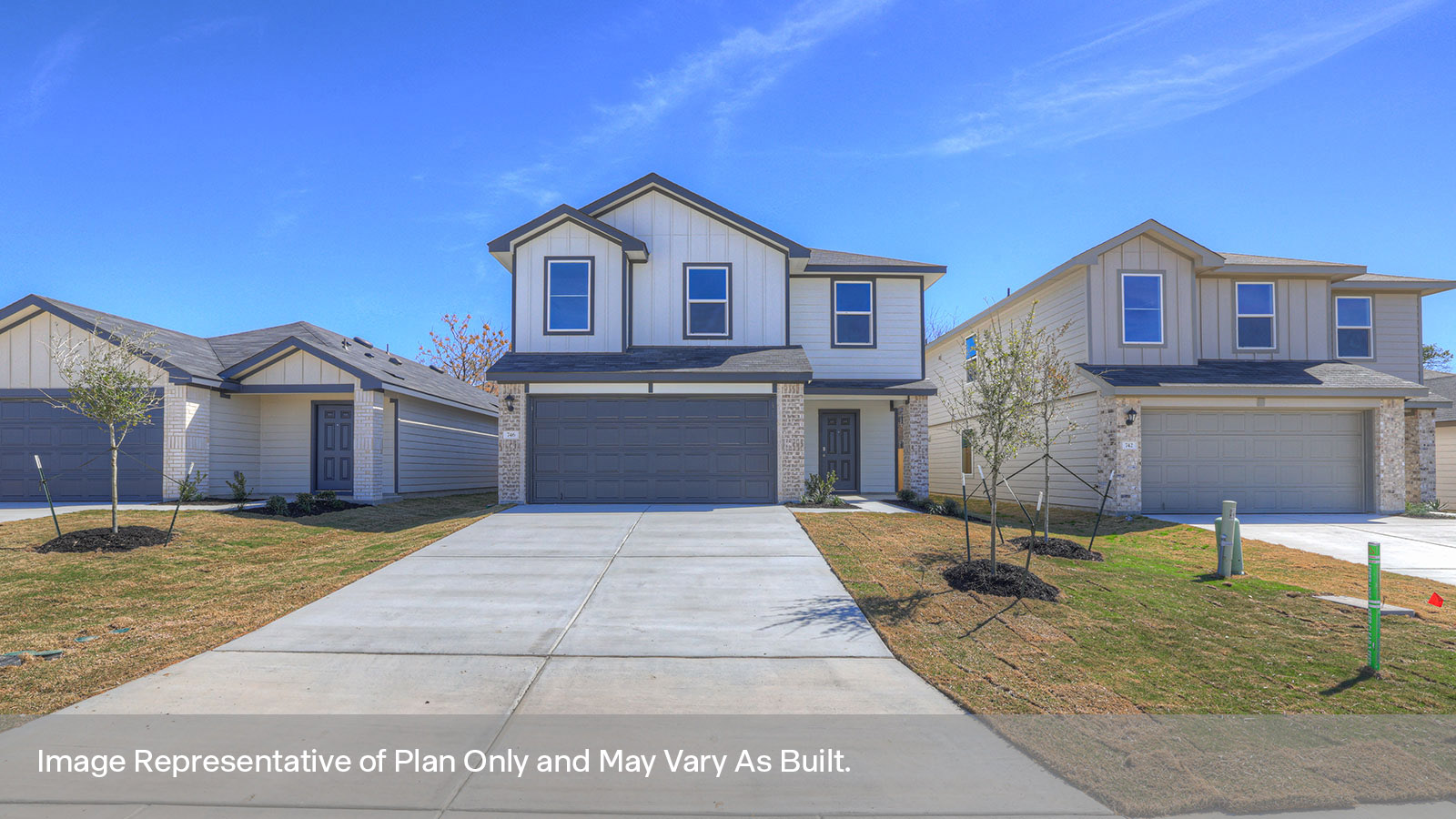 2-story home with a two car garage and siding exterior