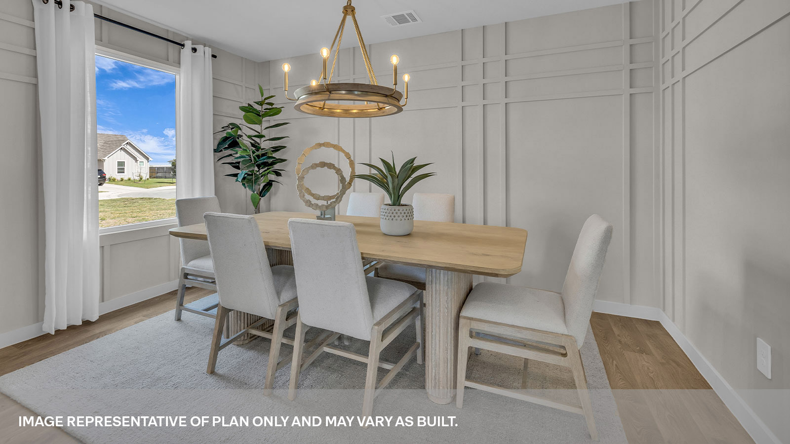 Dining room with vinyl flooring and one window.