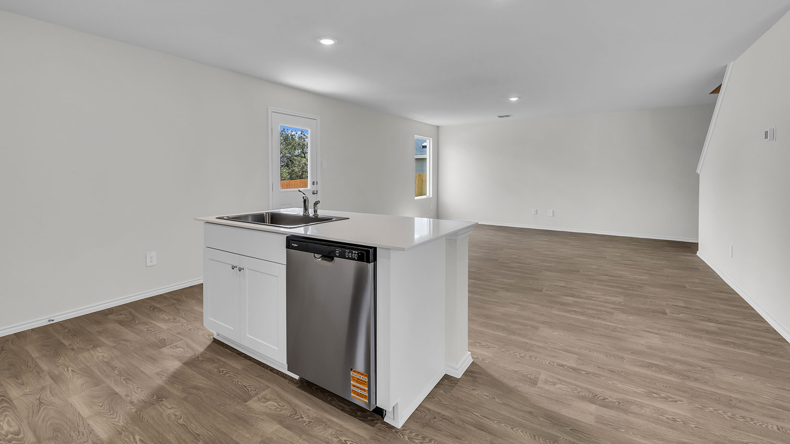 Kitchen island overlooking the dining room and living room.