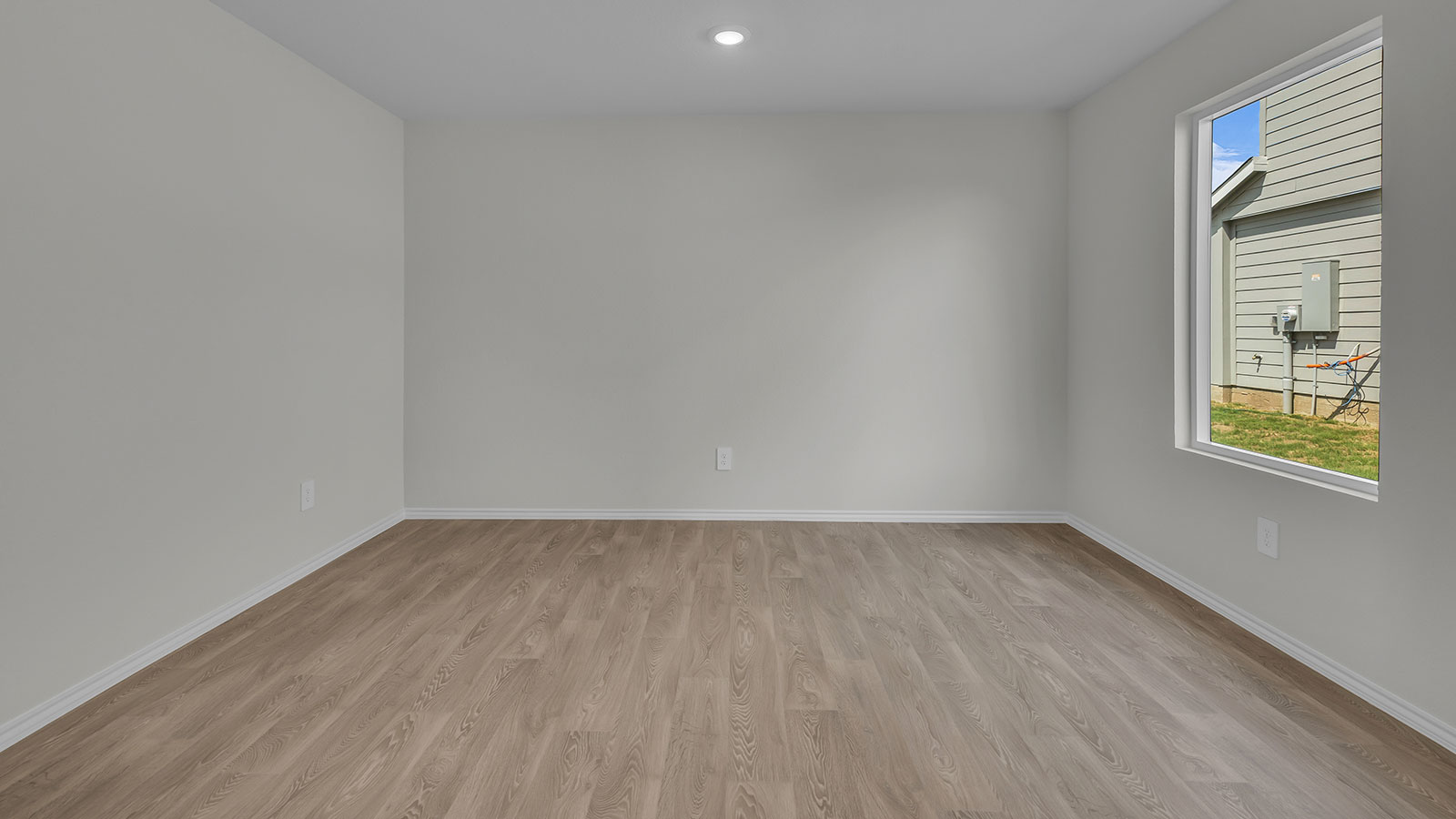 Dining room and living room with vinyl flooring and 1 window.