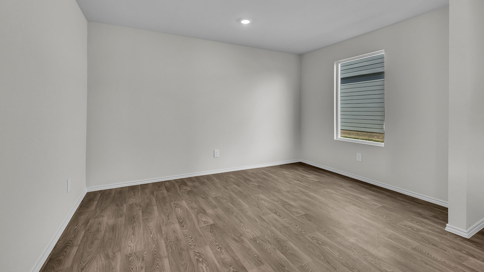 Dining room and living room with vinyl flooring and 1 window.