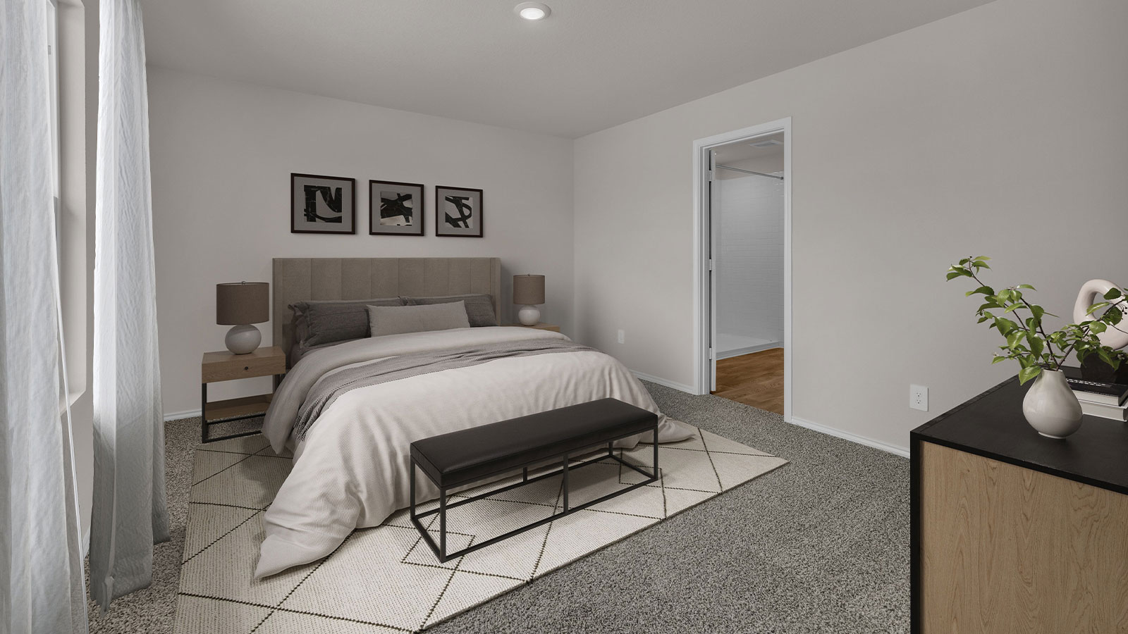 Virtually staged main bedroom with bed frame and night stands.