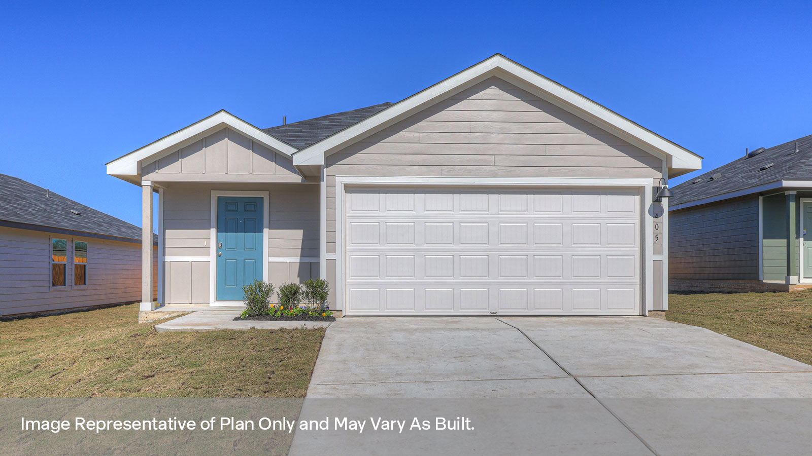 Single-story farmhouse with 2 car garage.