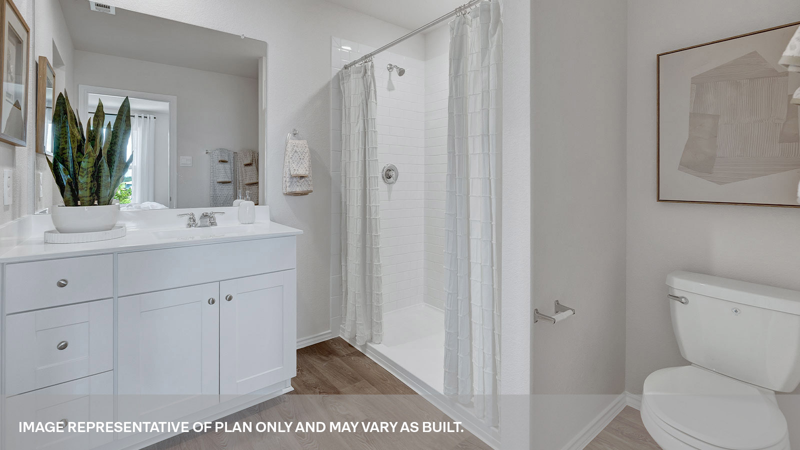 Main bathroom with shower, toilet, and sink.