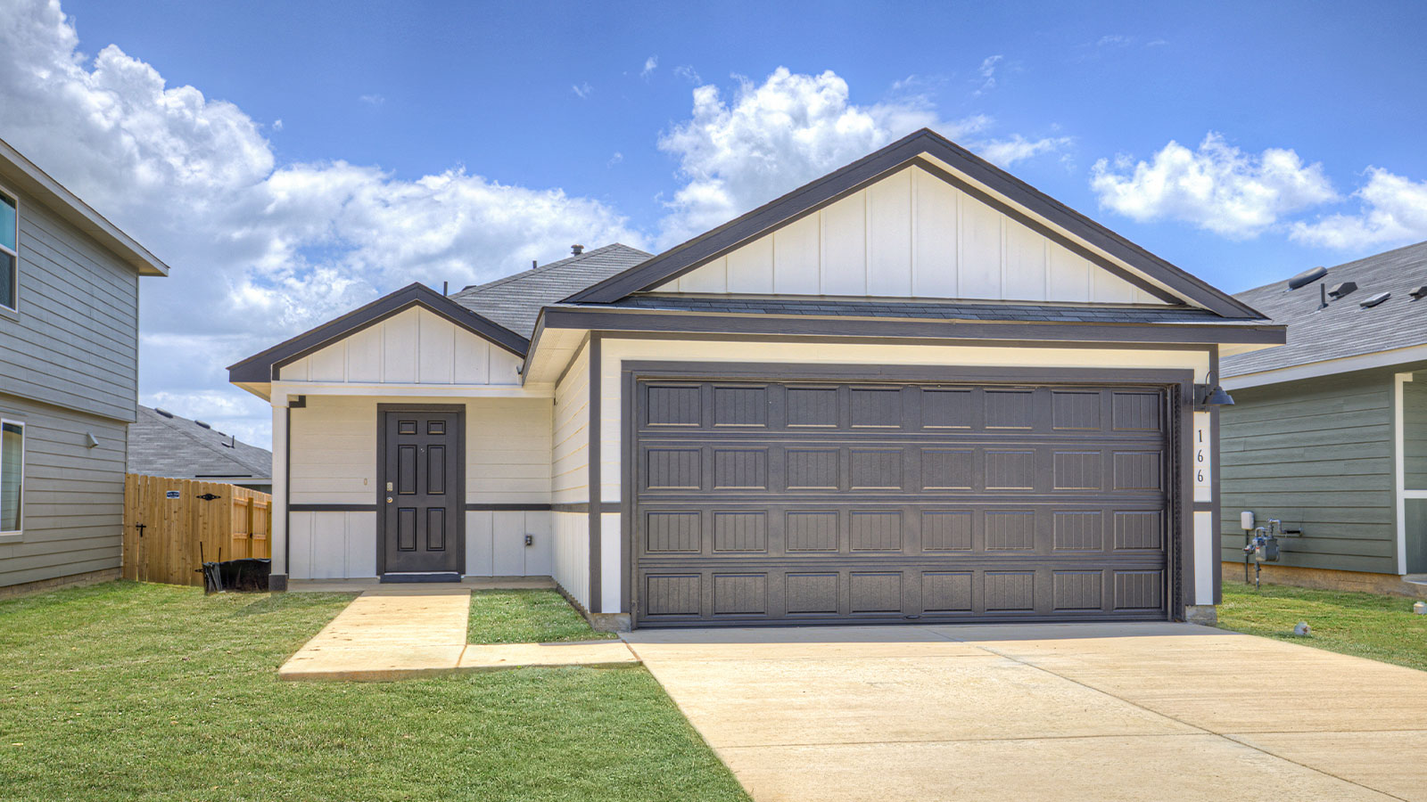 Single-story with farmhouse exteriors.