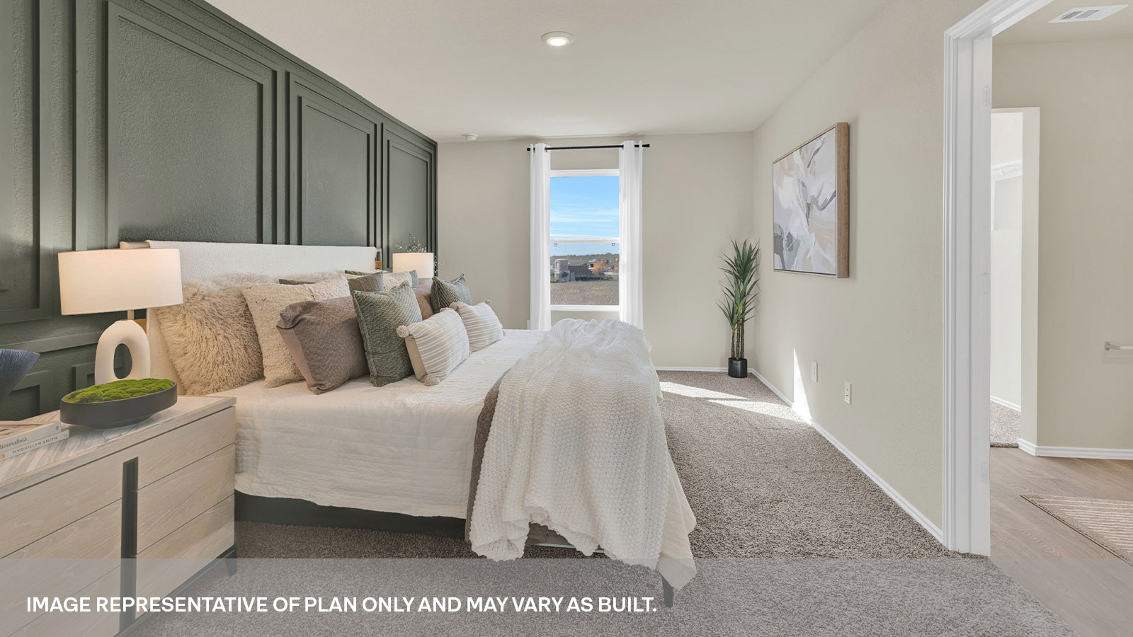 Main bedroom with carpeting and one window.