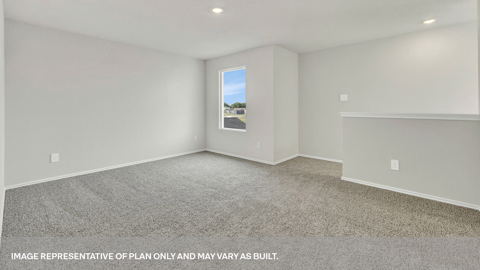 Gameroom on the second floor with carpeting and one window.