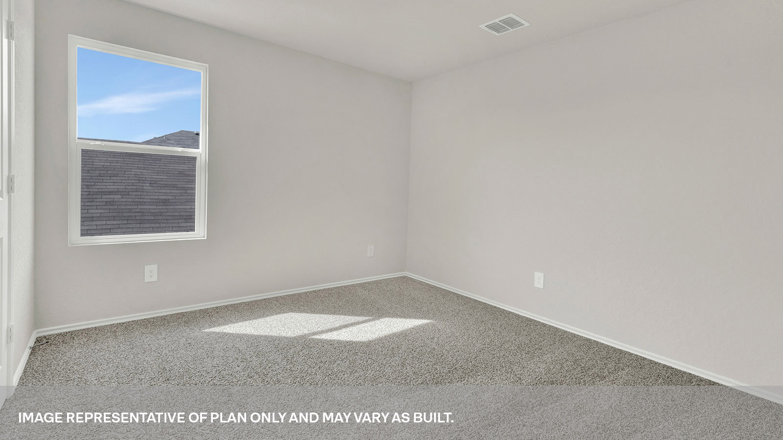 Secondary bedroom with carpeting and one window.