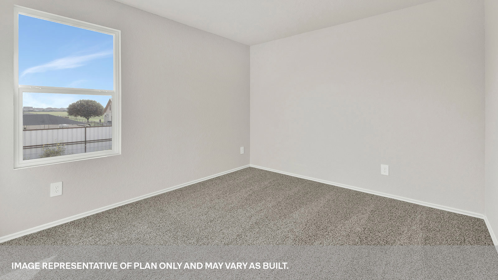 Secondary bedroom with carpeting and one window.