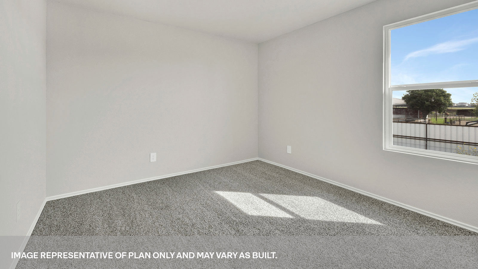 Secondary bedroom with carpeting and one window.