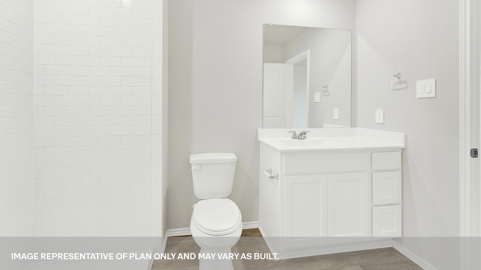Hall bathroom toilet and vanity.