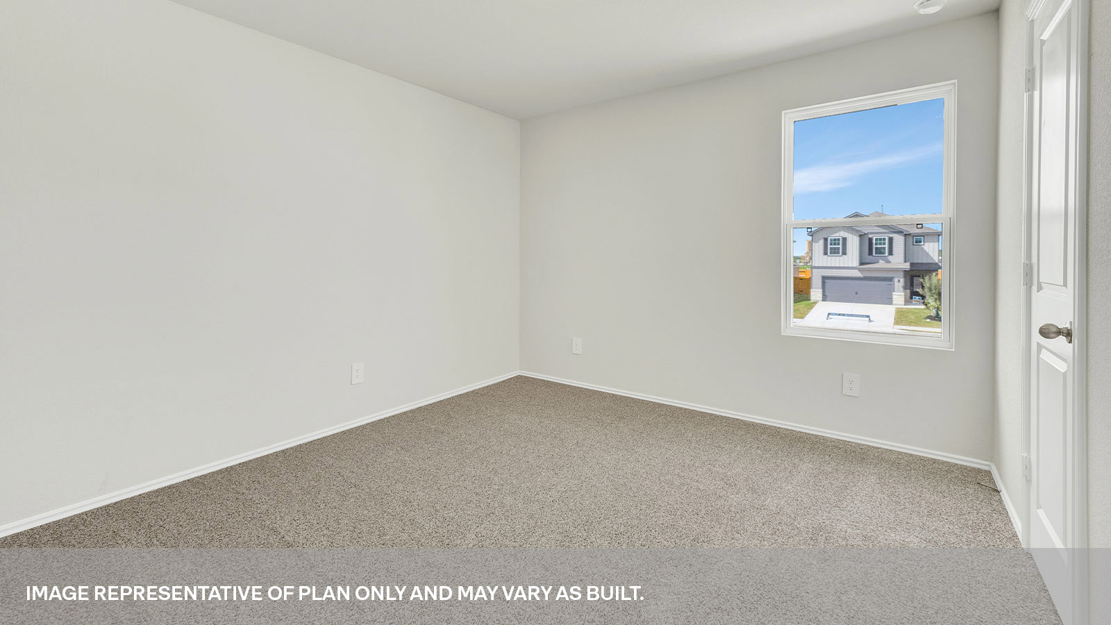 Secondary bedroom with carpeting and one window.